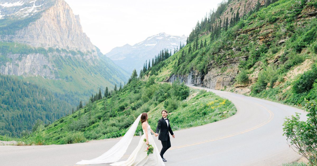Couple exploring Going-to-the-Sun Road during their Glacier National Park elopement